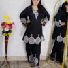 Woman wearing Premium Cotton Embroidered Co-Ord Set with Embroidered Kurta and Matching Pants available in Black, Green, Brown and Maroon colors