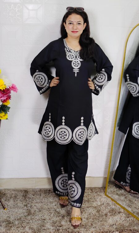 Woman wearing Premium Cotton Embroidered Co-Ord Set with Embroidered Kurta and Matching Pants available in Black, Green, Brown and Maroon colors