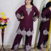 Woman wearing Premium Cotton Embroidered Co-Ord Set with Embroidered Kurta and Matching Pants available in Black, Green, Brown and Maroon colors