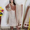 Woman wearing Cream Brown Evil Eye Printed Pure Cotton 3 Piece Suit Set with Matching Dupatta