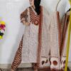 Woman wearing Cream Brown Evil Eye Printed Pure Cotton 3 Piece Suit Set with Matching Dupatta