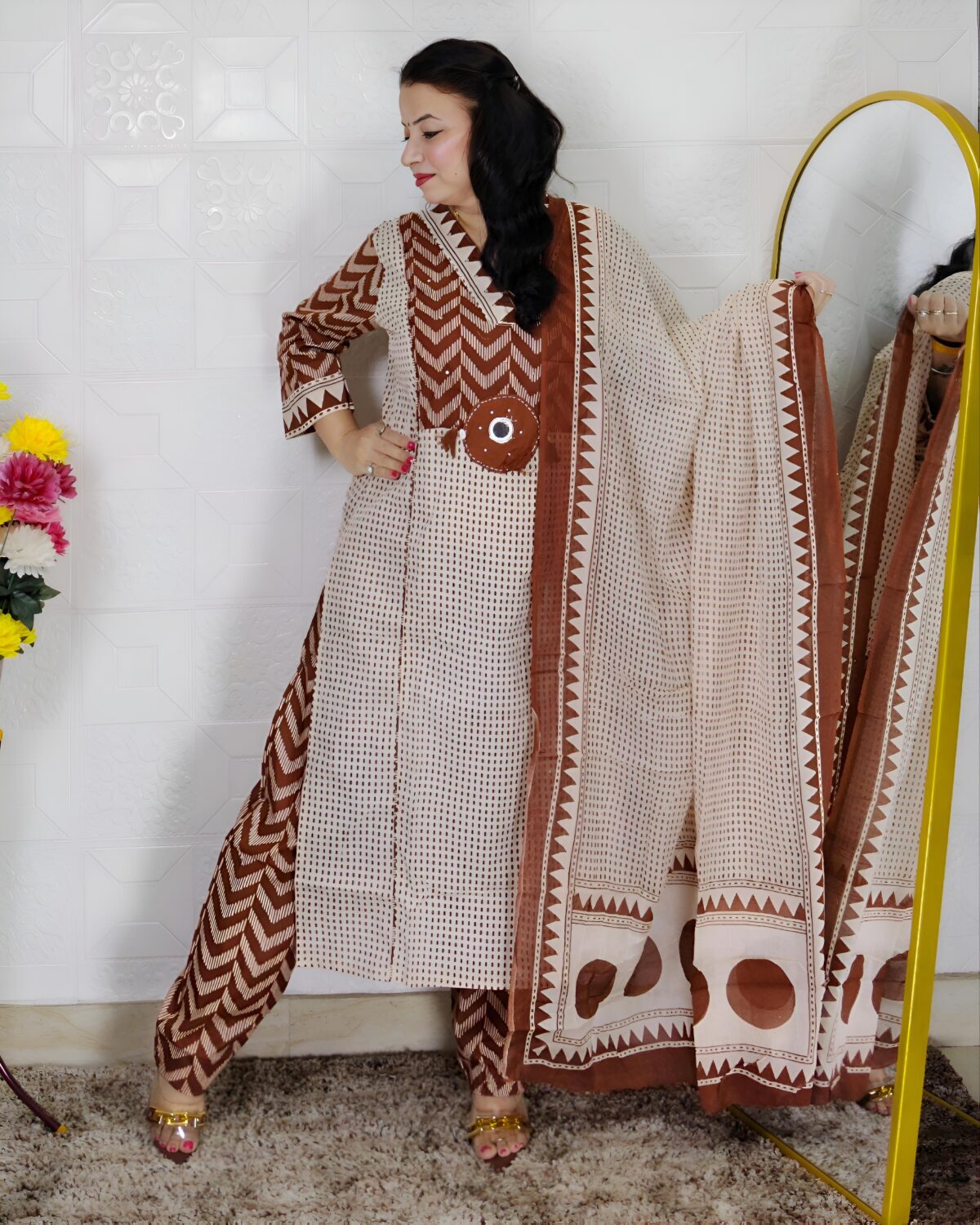 Woman wearing Cream Brown Evil Eye Printed Pure Cotton 3 Piece Suit Set with Matching Dupatta