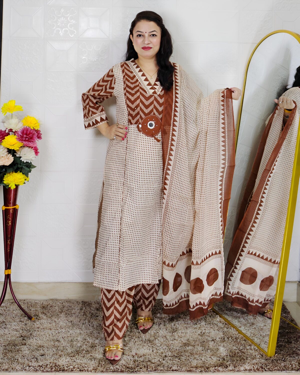 Woman wearing Cream Brown Evil Eye Printed Pure Cotton 3 Piece Suit Set with Matching Dupatta