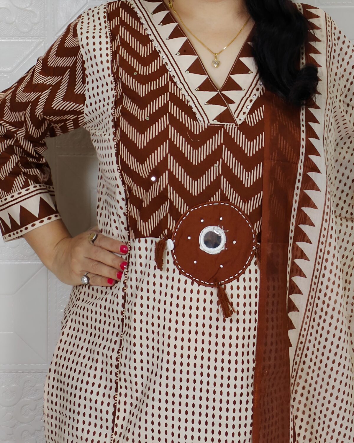 Woman wearing Cream Brown Evil Eye Printed Pure Cotton 3 Piece Suit Set with Matching Dupatta