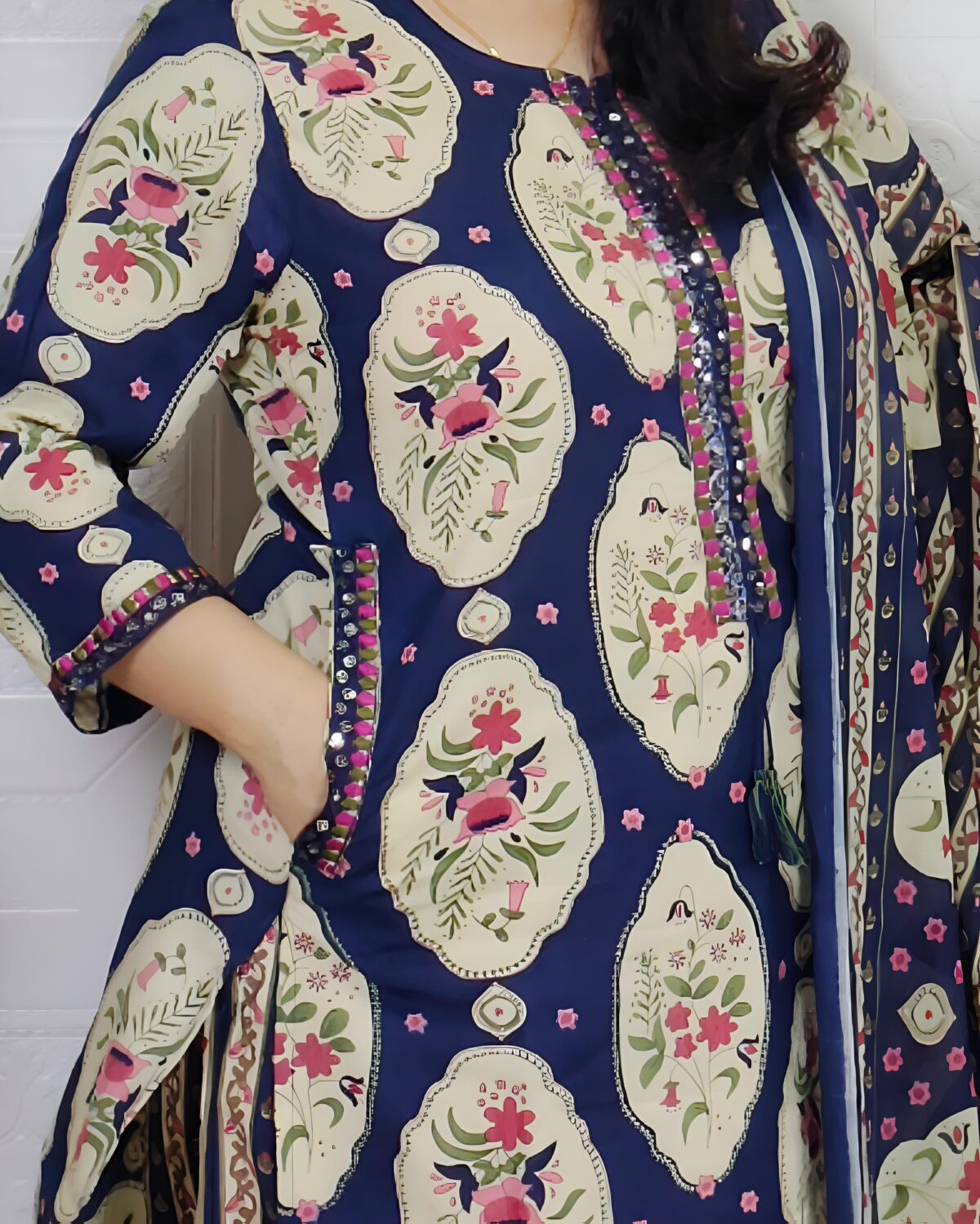 Woman wearing Navy Blue Ajrakh Print Premium Cotton Straight Kurta Suit Set with Printed Palazzo Pants and Matching Cotton Dupatta