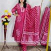 Woman wearing Pink Bandhani Print Premium Cotton Straight Kurta Suit Set with Printed Pants and Matching Cotton Dupatta