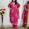 Woman wearing Pink Bandhani Print Premium Cotton Straight Kurta Suit Set with Printed Pants and Matching Cotton Dupatta