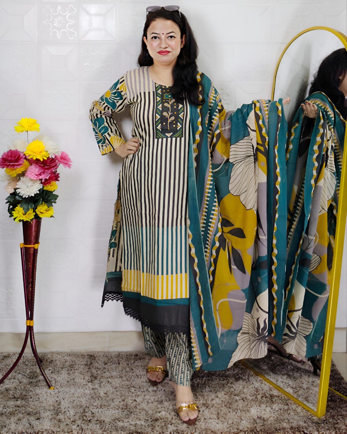 Woman wearing Teal Green Printed Cotton Straight Kurta Suit Set with Printed Palazzo Pants and Floral Printed Dupatta