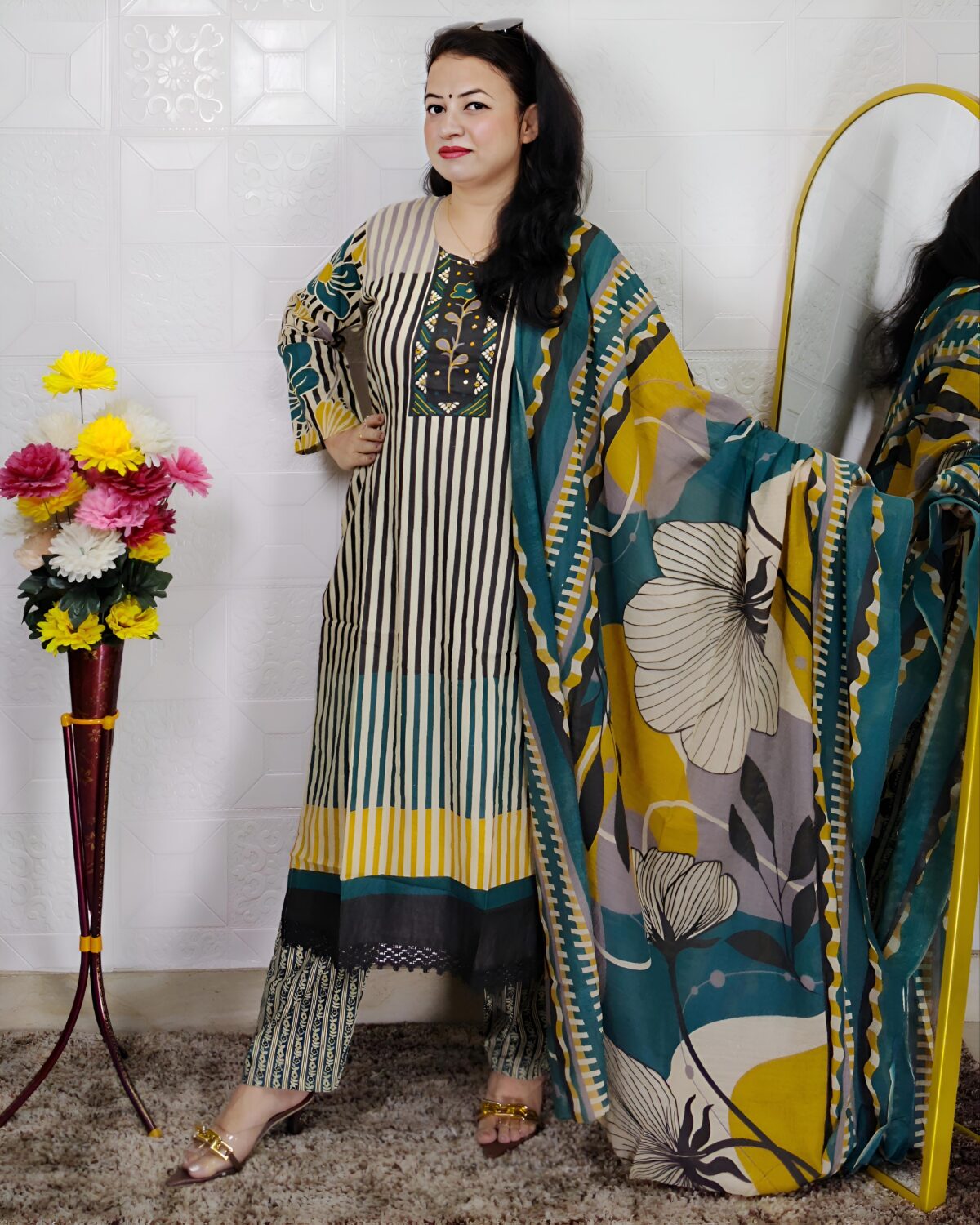 Woman wearing Teal Green Printed Cotton Straight Kurta Suit Set with Printed Palazzo Pants and Floral Printed Dupatta